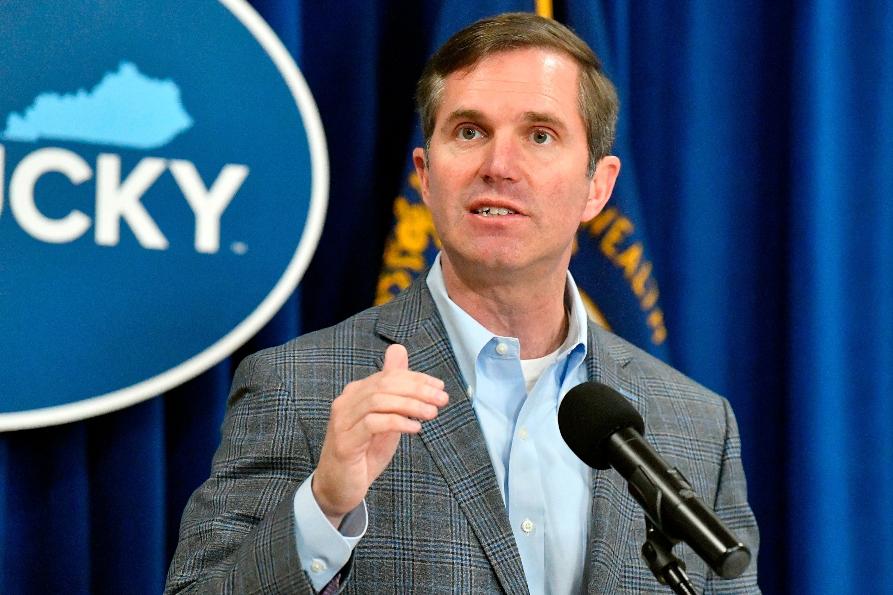 PHOTO: Kentucky Gov. Andy Beshear speaks in the Rotunda of the state Capitol, Mar 26, 2024, in Frankfort, Ky. 