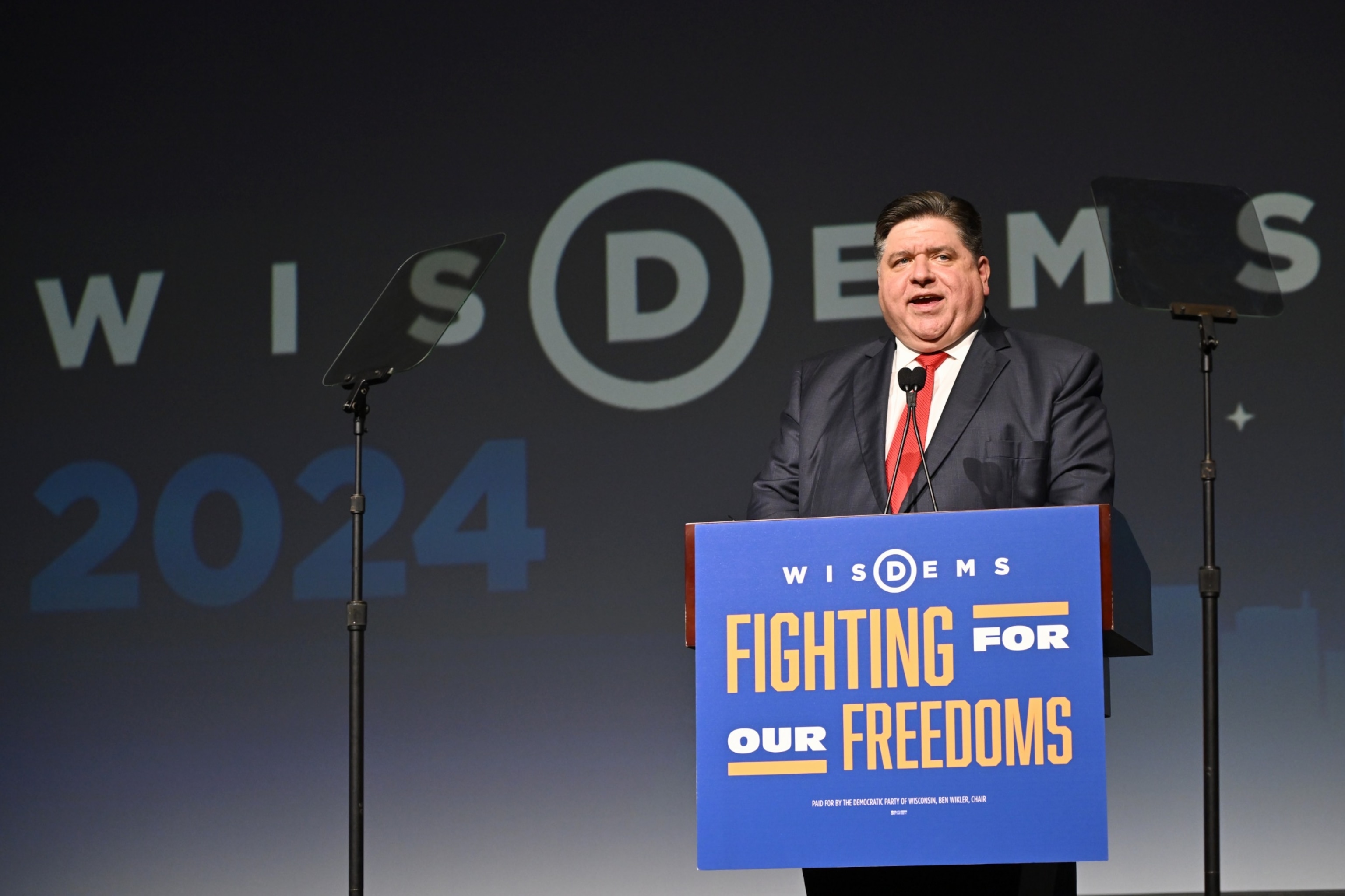 PHOTO: Governor of Illinois JB Pritzker speaks during the WisDems 2024 State Conventionm June 8, 2024, in Milwaukee.