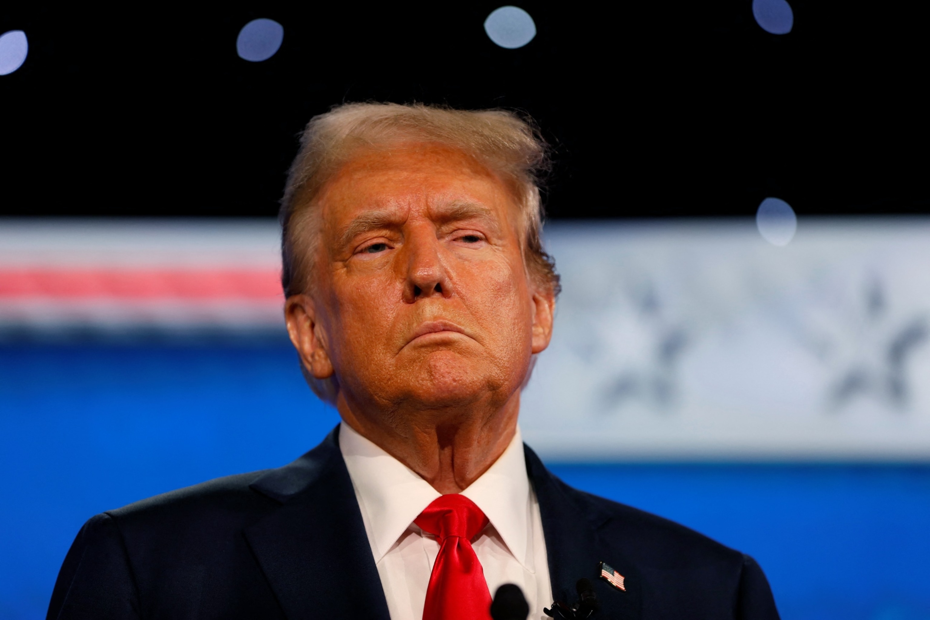 PHOTO: Republican presidential candidate and former U.S. President Donald Trump attends the first presidential debate hosted by CNN in Atlanta, June 27, 2024.