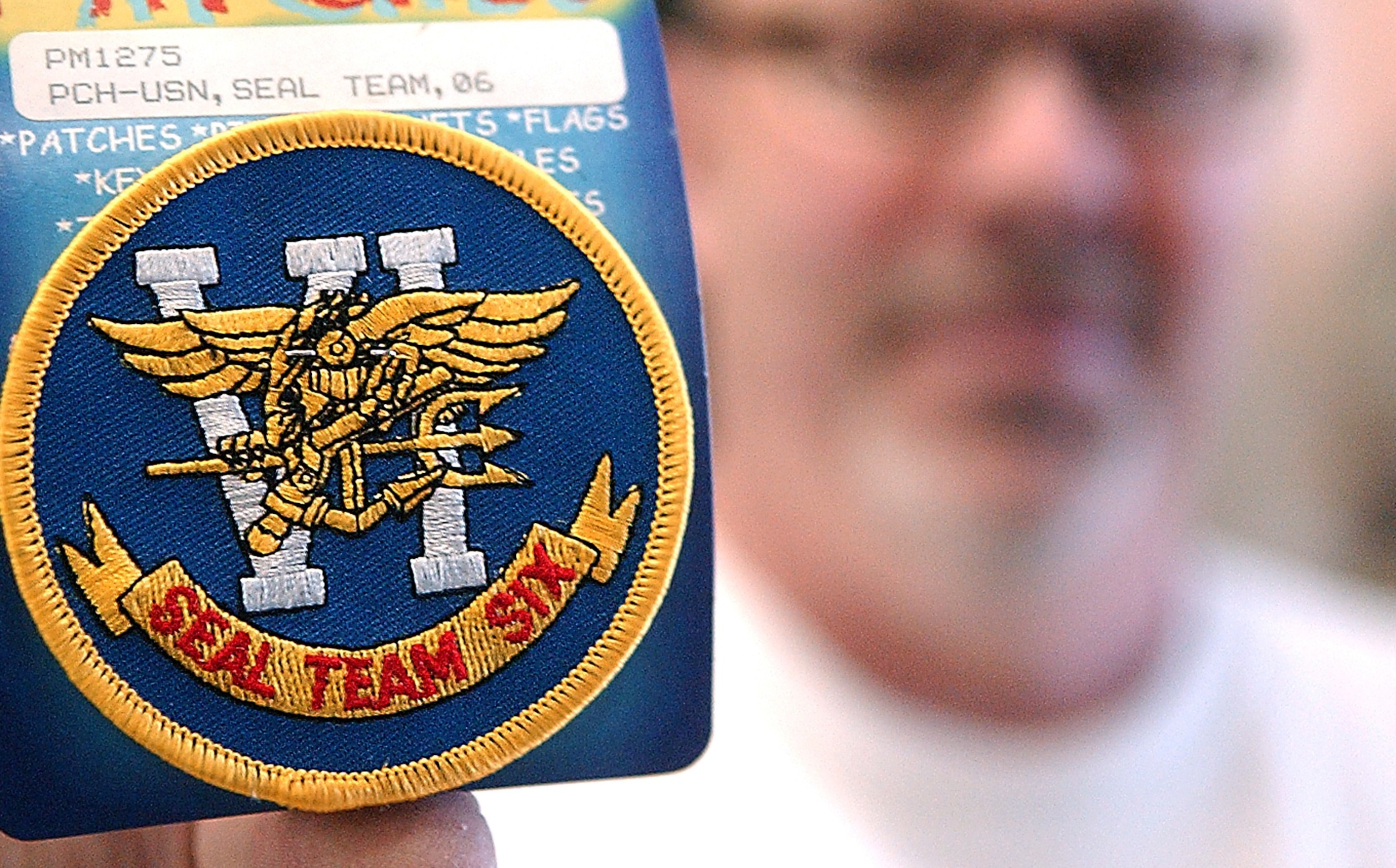 PHOTO: Outdoor Army-Navy store owner Bill Hyland displays the U.S. Navy Seal Team Six patch available at his store on Main Avenue in Ashtabula, OH, in an undated photo.