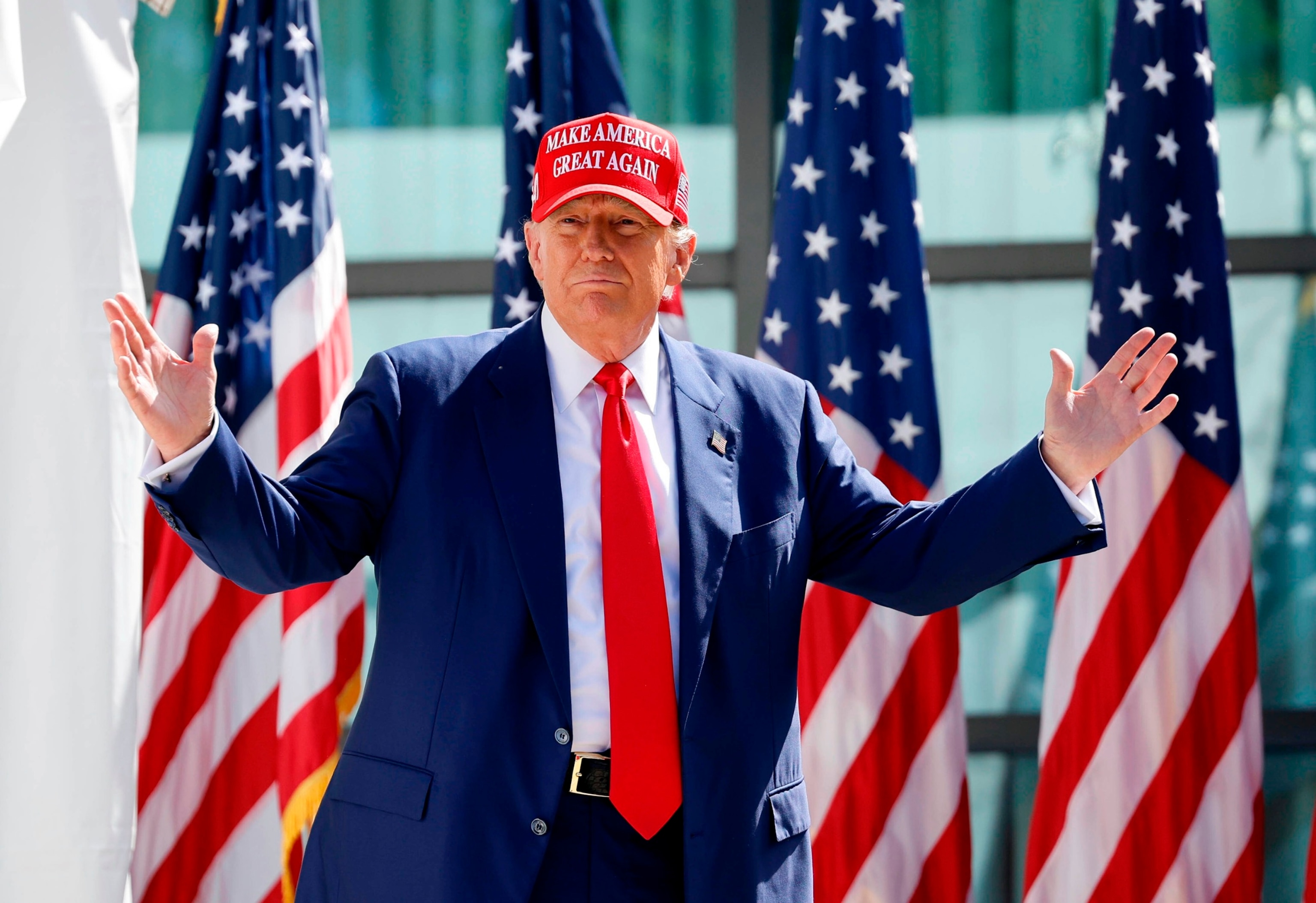 PHOTO: Republican presidential candidate former President Donald Trump enters at a campaign event, June 18, 2024, in Racine, Wis. 